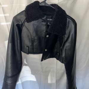 I AM GIA. Black coat